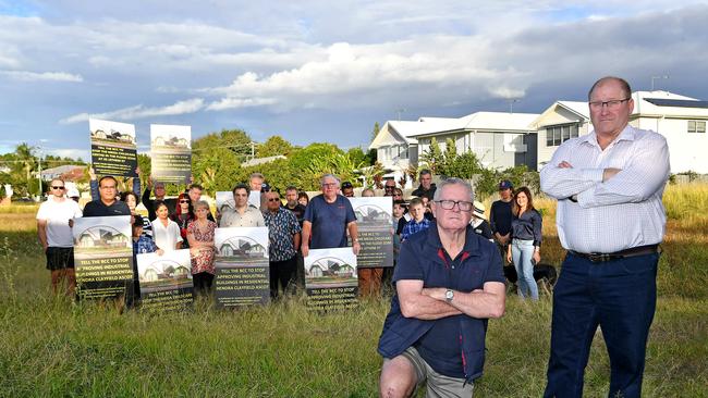 Paul Gannon and Shane Matthews (far right) with Lethem St residents at the former bowlo site. Picture: John Gass