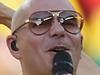 SAO PAULO, BRAZIL - JUNE 12: (L-R) Performers Pitbull, Jennifer Lopez and Claudia Leitte perform during the Opening Ceremony of the 2014 FIFA World Cup Brazil prior to the Group A match between Brazil and Croatia at Arena de Sao Paulo on June 12, 2014 in Sao Paulo, Brazil. (Photo by Buda Mendes/Getty Images)