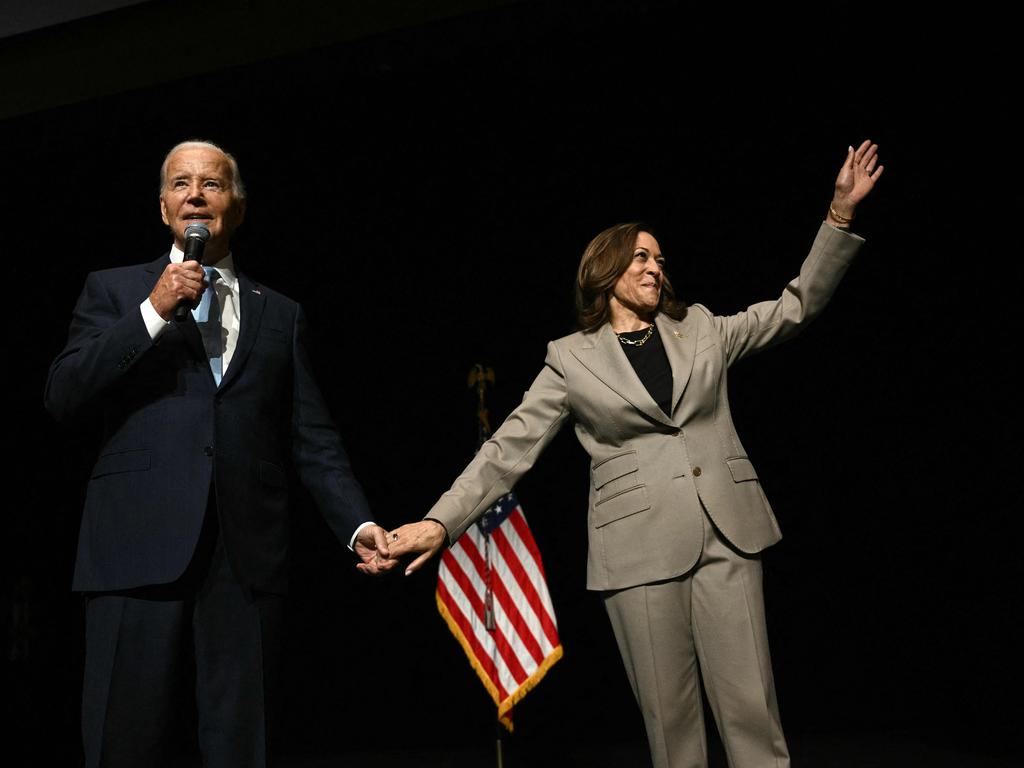 Kamala Harris waves as President Joe Biden speaks in the overflow room at Prince George's Community College in Largo, Maryland. Picture: AFP