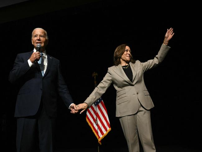 Kamala Harris waves as President Joe Biden speaks in the overflow room at Prince George's Community College in Largo, Maryland. Picture: AFP