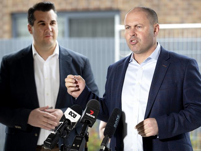 Treasurer Josh Frydenberg (right) and Housing Minister Michael Sukkar speak at Stockland Waterlea housing estate in Rowville yesterday. Picture: NCA NewsWire / David Geraghty