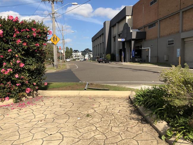 It is understood the vehicle came down Rembrandt St before ploughing over a sign and into the building.