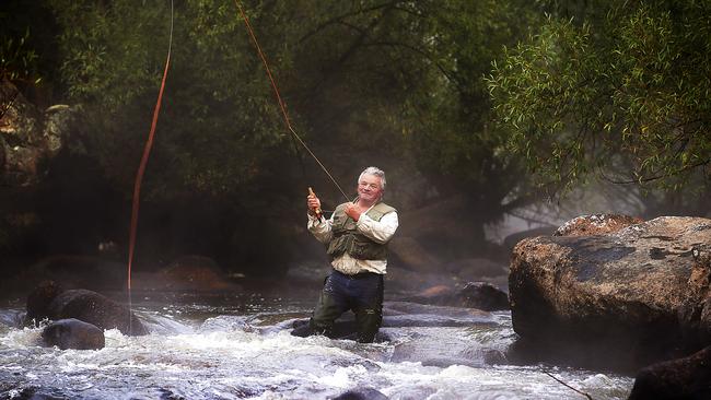 Fly fisherman Mark Fountain catches rainbow trout on the Murrumbidgee River at Ashvale, near the Snowy Mountains town of Cooma. Picture: Jane Dempster/The Australian