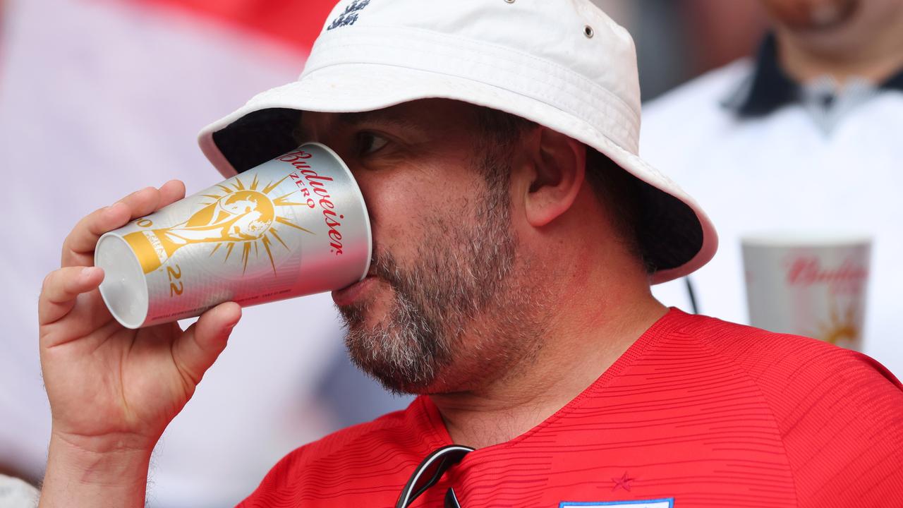 An England fan drinks a non-alcoholic beer prior to the FIFA World Cup Qatar 2022 Group B match between England and IR Iran. (Photo by Marc Atkins/Getty Images)