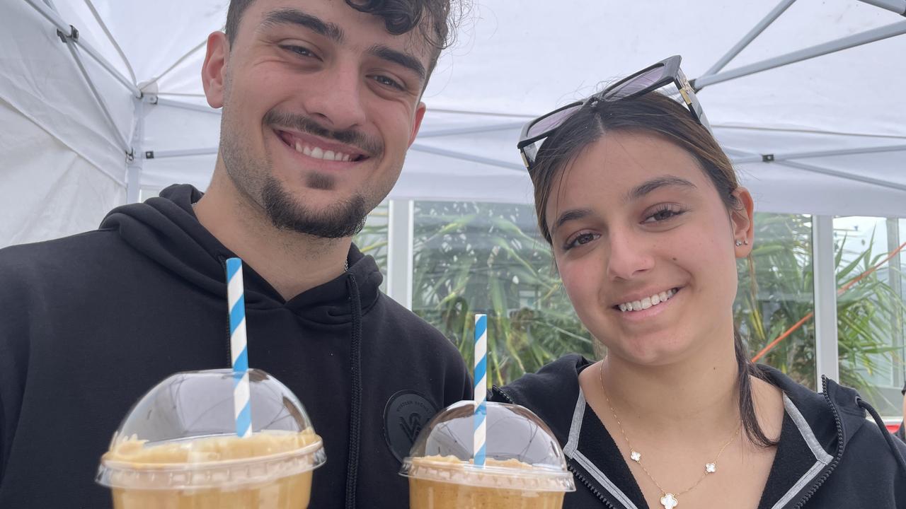 Thomas Raketic and Anastasia Savidis whipped up frappés for the thirsty throng.