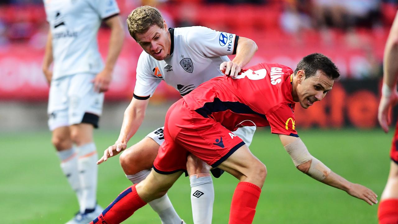 Brisbane Roar’s Thomas Kristensen and Isaias from Adelaide United battle for the ball at Coopers Stadium. Picture: Mark Brake/Getty Images