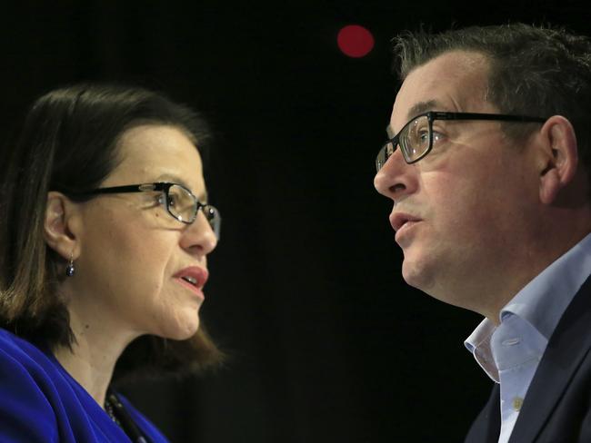 MELBOURNE, AUSTRALIA - JULY 17: (EDITORS NOTE: Image produced with multiple exposure in camera.) Victorian Health Minister Jenny Mikakos and Victorian Premier Daniel Andrews speak to the media at the daily briefing on July 17, 2020 in Melbourne, Australia. Victoria has recorded 428 new cases of coronavirus overnight and three new deaths, bringing the total number of deaths in the state from COVID-19 to 32. Metropolitan Melbourne and the Mitchell shire are currently in lockdown following the rise in COVID-19 cases through community transmissions. The new restrictions came into effect on Thursday 9 July, with residents in lockdown areas under stay at home orders until 19 August. People are only able to leave home have for exercise or work, to buy essential items including food or to access childcare and healthcare. (Photo by Darrian Traynor/Getty Images)