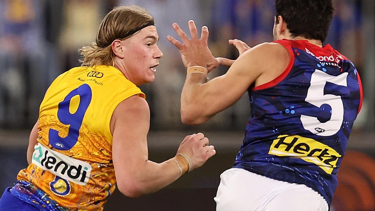 PERTH, AUSTRALIA - MAY 19: Harley Reid of the Eagles fends off Christian Petracca of the Demons during the round 10 AFL match between Waalitj Marawar (the West Coast Eagles) and Narrm (the Melbourne Demons) at Optus Stadium, on May 19, 2024, in Perth, Australia. (Photo by Paul Kane/Getty Images)