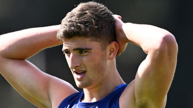 MELBOURNE, AUSTRALIA - NOVEMBER 17: Harry Sheezel of the kangaroos catches his breath during a North Melbourne Kangaroos AFL training session at Arden Street Ground on November 17, 2023 in Melbourne, Australia. (Photo by Quinn Rooney/Getty Images)