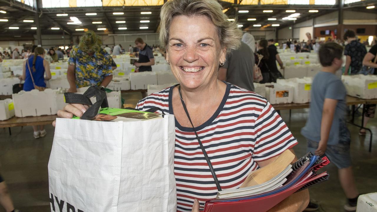 Loaded up with bargain books from BookFest is Sherelle Scifleet of Oakey. The Chronicle Lifeline BookFest at Toowoomba Showgrounds. Saturday, March 4, 2023. Picture: Nev Madsen.