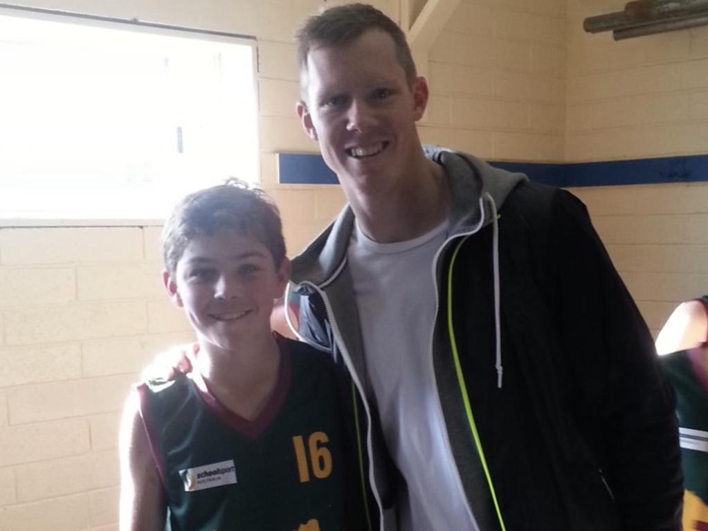 Clearly Tiger Sam Banks (L) has now learnt enough about Tigers great Jack Riewoldt.