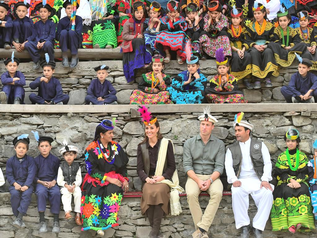 With local kids in the Himalayas. Picture: Samir Hussein — Pool/Getty Images.