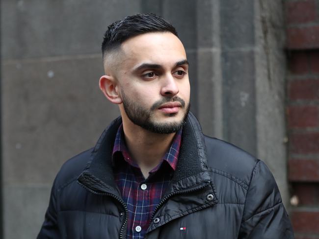 Eathan Cruse leaves the Victorian Supreme Court in Melbourne, Tuesday, August 27, 2019. Eathan Cruse is suing the state for police brutality after he was allegedly kicked in the head, slammed on the fridge and hit with a gun during a raid. (AAP Image/David Crosling) NO ARCHIVING