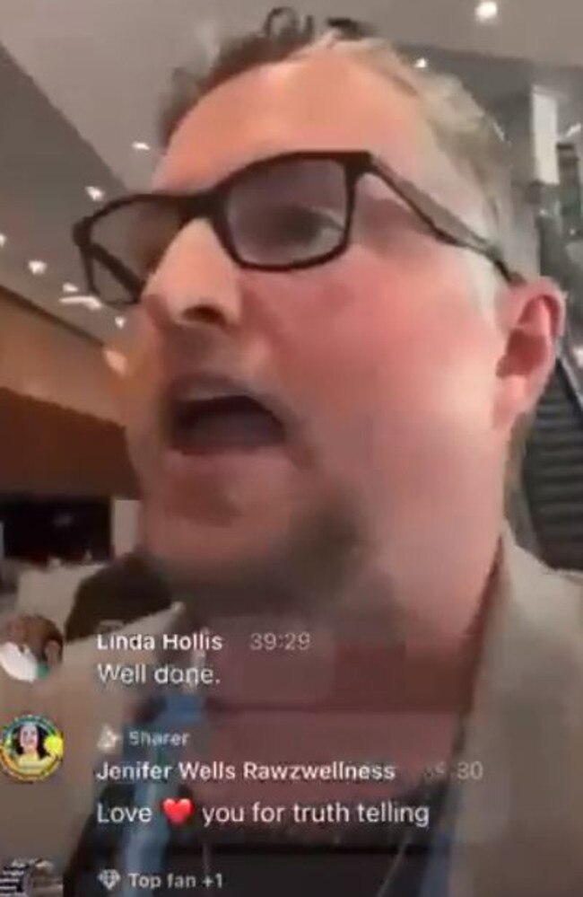 Dr William Bay continued his live video as he was escorted out by security.