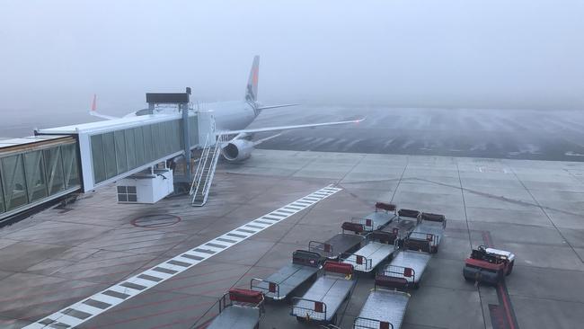 Thick fog at Adelaide Airport. Picture: Tait Schmaal