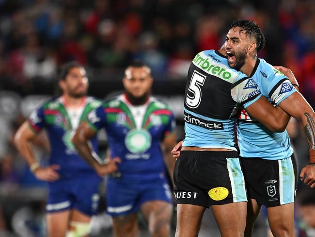 AUCKLAND, NEW ZEALAND - MARCH 08: Ronaldo Mulitalo of the Sharks and Briton Nikora of the Sharks celebrate winning the round one NRL match between New Zealand Warriors and Cronulla Sharks at Go Media Stadium Mt Smart, on March 08, 2024, in Auckland, New Zealand. (Photo by Hannah Peters/Getty Images)