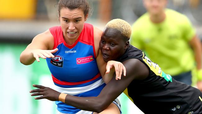 Akec Makur Chuot tackling Bonnie Toogood during an AFLW pre-season match. Picture: Getty