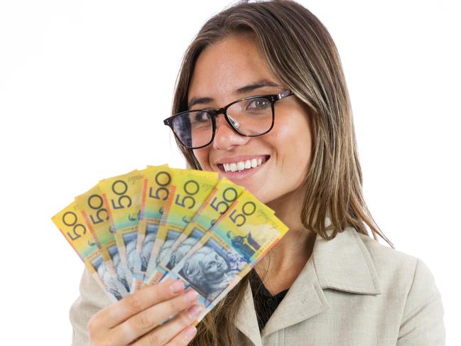 A young woman holding Australian cash. Picture: iStock.