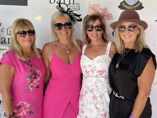 Jill Sharman, Kirra Dinnery, Danielle Stevenson and Dani Sams getting into the cup spirit at Adamstown Bowling Club. Picture: Dan Proudman