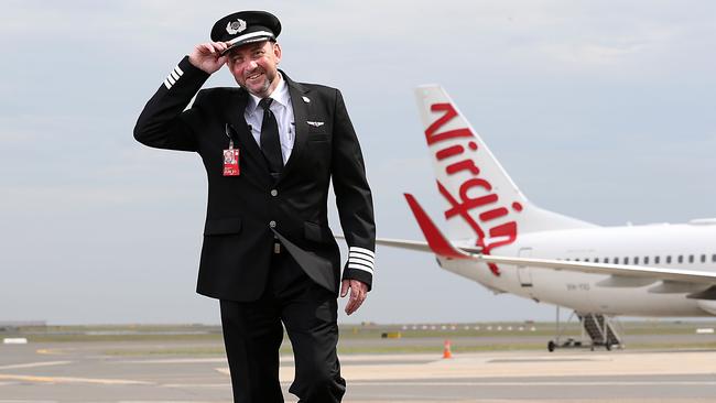 Virgin pilot Robert Ricketts is ready for takeoff as more jets are allowed on the once-busy Melbourne-Sydney air route. Picture: Jane Dempster