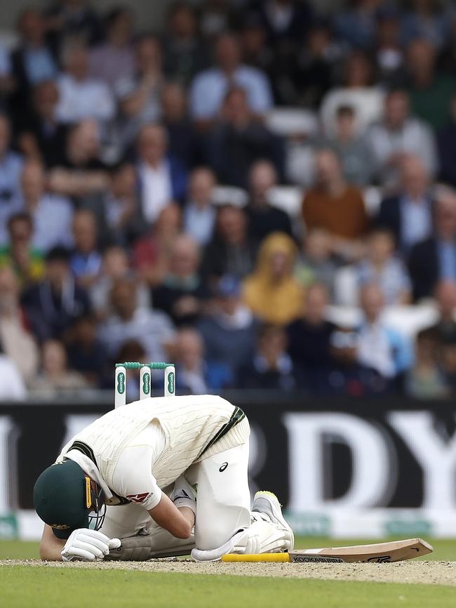 Labuschagne of Australia falls to the ground after being struck in the groin by a delivery from Stuart Broad. Picture: Ryan Pierse/Getty