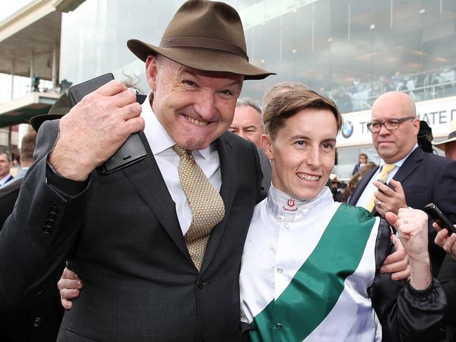 David Hayes and Cory Parish celebrate Boom Time’s Caulfield Cup win. Picture: AAP Images