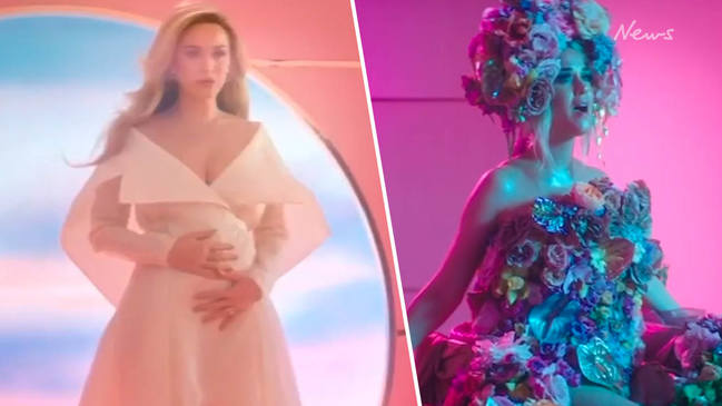 Katy Perry reveals baby bump in new music video teaser