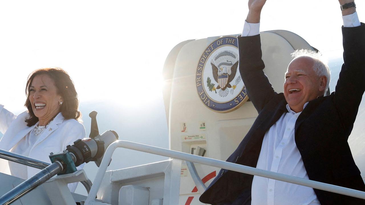 Kamala Harris and her pick for vice president, Tim Walz, disembarking Air Force Two in Michigan. Picture: Jeff Kowalsky/AFP