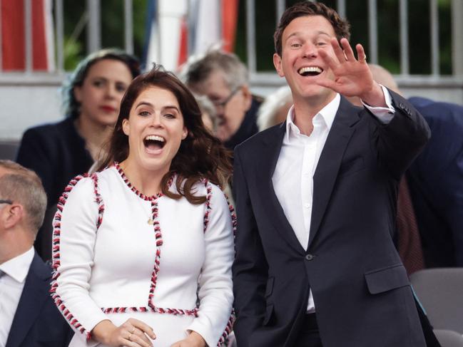 Princess Eugenie and Jack Brooksbank react during the Platinum Party. Picture: AFP