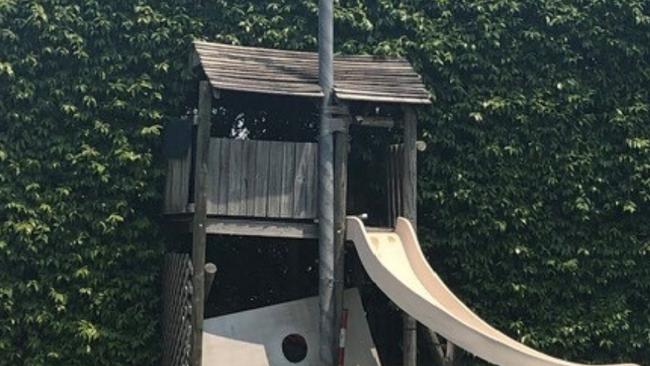 Power was switched off after an Ausgrid crew found this cubby house built around a power pole.