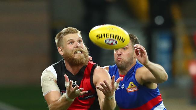 GOLD COAST, AUSTRALIA – JULY 17: Michael Hurley of the Bombers takes a mark during the round 7 AFL match between the Essendon Bombers and the Western Bulldogs at Metricon Stadium on July 17, 2020 in Gold Coast, Australia. (Photo by Chris Hyde/Getty Images)