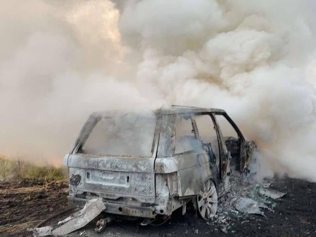 Car fire spreads into surrounding paddocks in Rossmore on Bringelly Rd. Picture: RFS