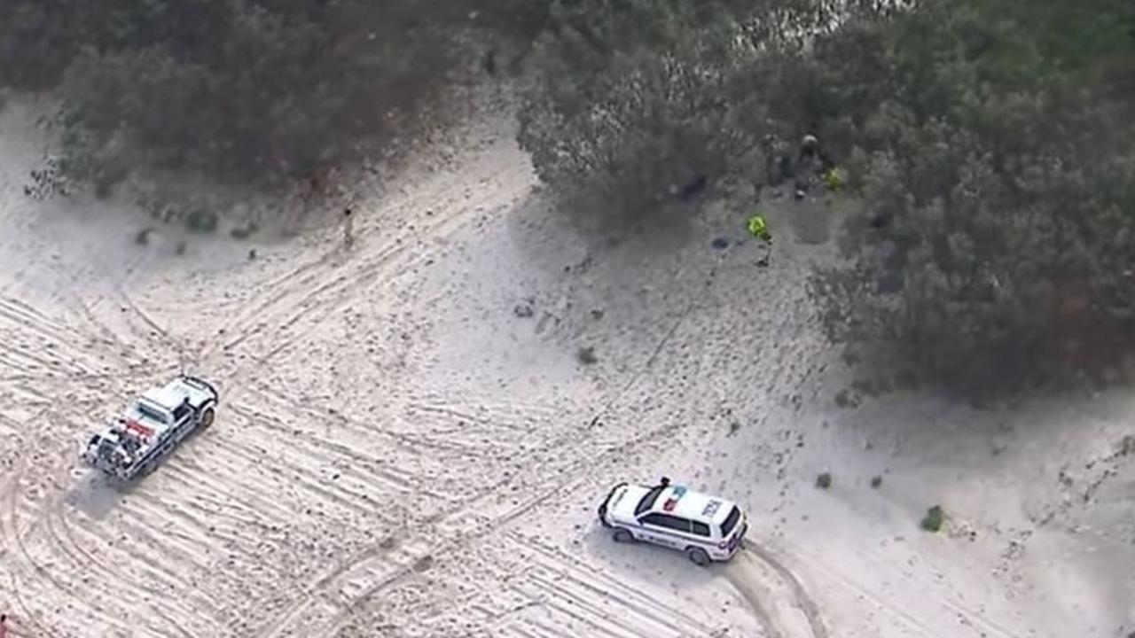 Queensland Paramedics and an RACQ Lifeflight rescue helicopter at the scene. Picture: NineNews