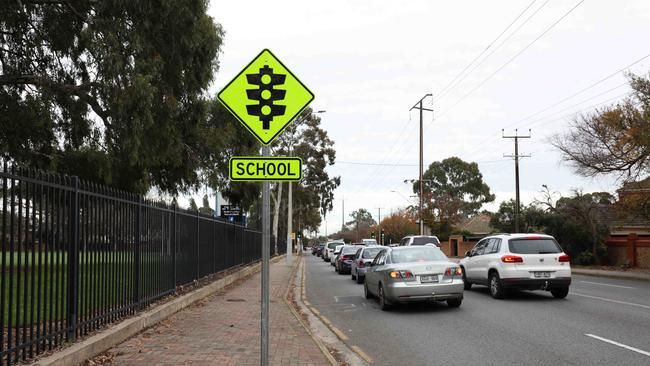 Newly installed traffic light warning signs on Kensington Road, approaching the Marryatville High School crossing. Picture: Emma Brasier