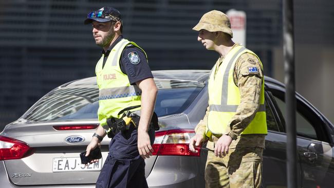 Authorities patrolling the Queensland-New South Wales border. Picture: Nigel Hallett