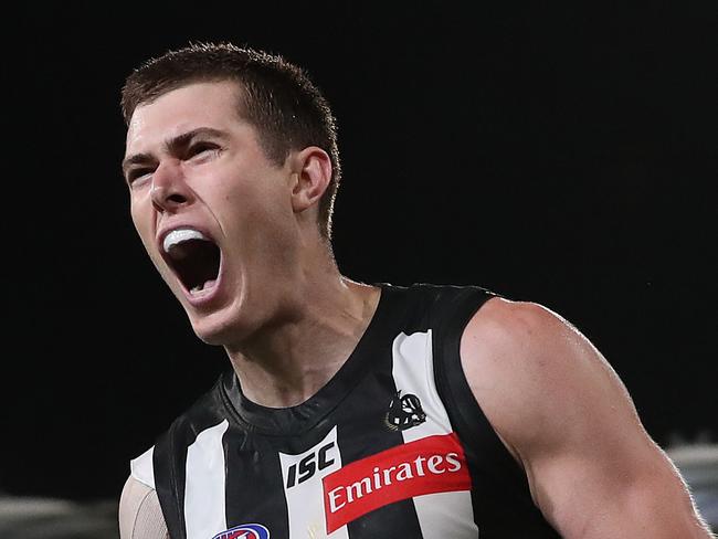 AFL Round 17. 14/09/2020. ..  Collingwood vs Gold Coast Suns at the Gabba, Brisbane .   Mason Cox of the Magpies celebrates his goal in the fourth quarter   . Pic: Michael Klein