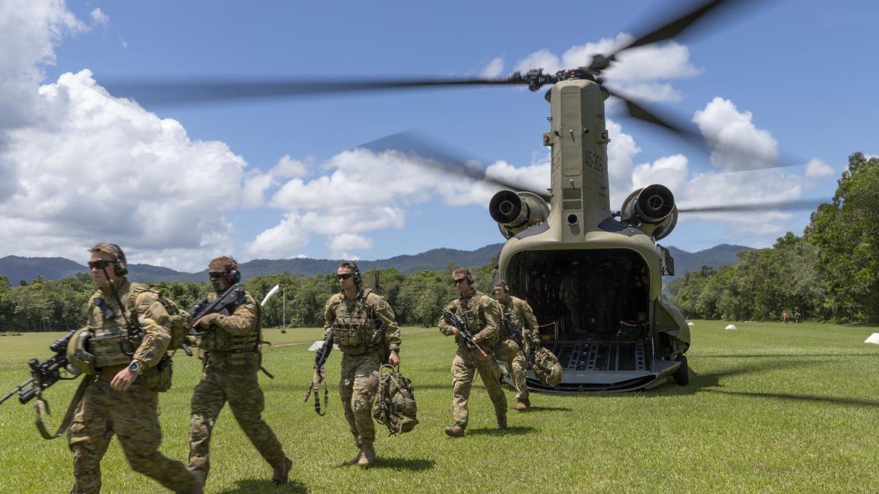 Australian Army soldiers from the 3rd Battalion, exit a CH-47 Chinook, during air mobile and stability operations training at the Combat Training Centre – Jungle Training Wing, Tully, Queensland. Picture: ADF