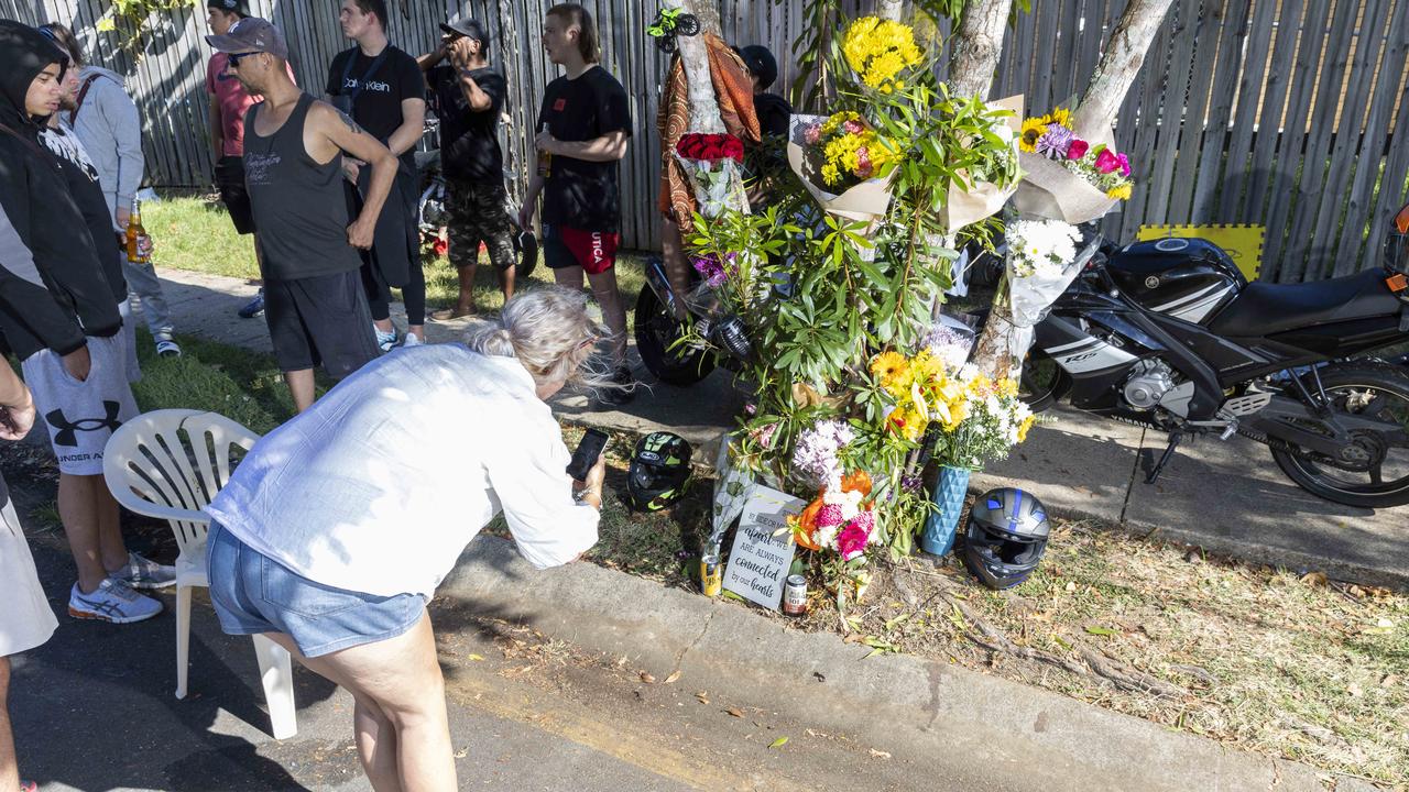 Mourners at the site where Jai Anderson died at Waterford West. Picture: Richard Walker