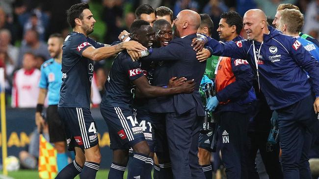 Melbourne Victory celebrate Leroy George’s goal against Adelaide.