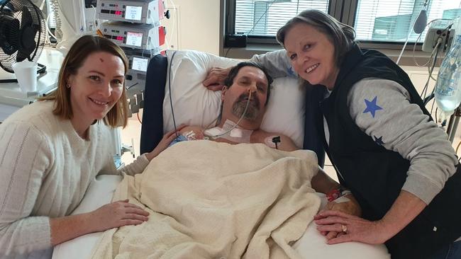 Dean and Karyn Bodin, and Dean’s stepdaughter Kristy, left, in the Royal Adelaide Hospital during Dean’s recovery.