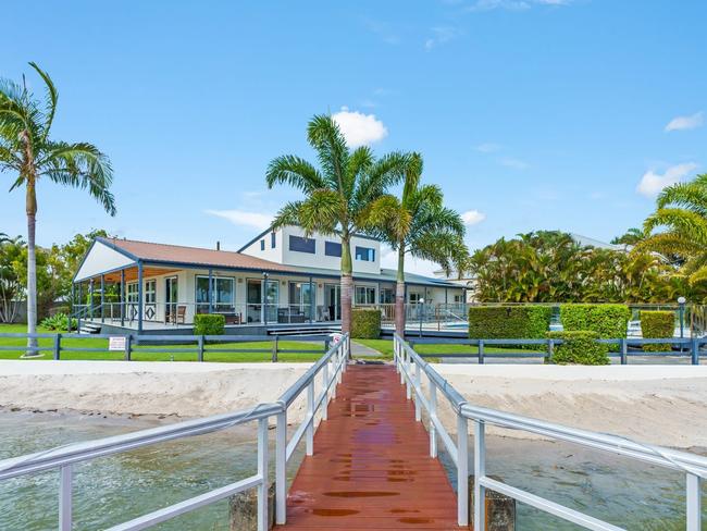 Absolute waterfront living is available at 1-3 Howard St, Runaway Bay.