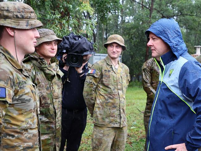 BRISBANE, AUSTRALIA - MARCH 9:  Prime Minister Anthony Albanese, Deputy Prime Minister and Minister for Defence, Richard Marles, Treasurer Jim Chalmers and the Minister for Emergency Management, Jenny McAllister during a visit to the Gallipoli Barracks on March 9, 2025 in Brisbane, Australia. Australia's east coast is experiencing severe weather as ex-Tropical Cyclone Alfred moves south. While downgraded from cyclone status, the weather system continues to bring damaging winds, heavy rainfall, and flash flooding, particularly in the Gold Coast and northern NSW regions. Authorities have issued severe weather warnings, and coastal areas remain at risk of significant erosion and hazardous surf conditions. Residents are urged to stay updated on local warnings, avoid floodwaters, and prepare for ongoing disruptions. (Photo by Tertius Pickard - Pool/Getty Images)