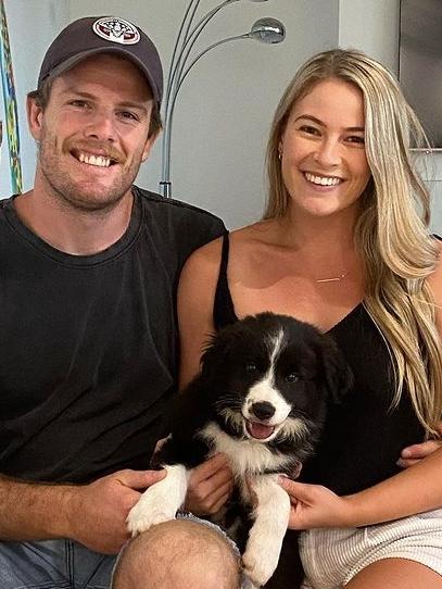 Lachlan Fitzgibbon and partner Sophie Hanlon with dog Billy. Credit: Instagram