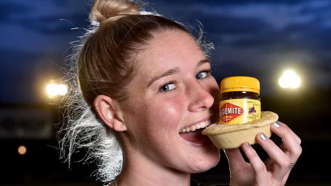 Carlton AFLW star Tayla Harris tries the new Vegemite and cheese pie from Four 'N Twenty. Picture: Jay Town