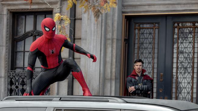 Doctor Strange (Benedict Cumberbatch) looks on at Spider-Man