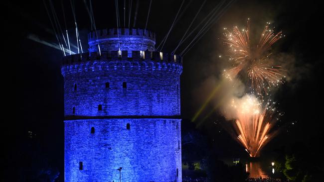 Fireworks explode over Thermaikos gulf next to the White Tower in Thessaloniki, Central Macedonia, Greece. Picture: AFP