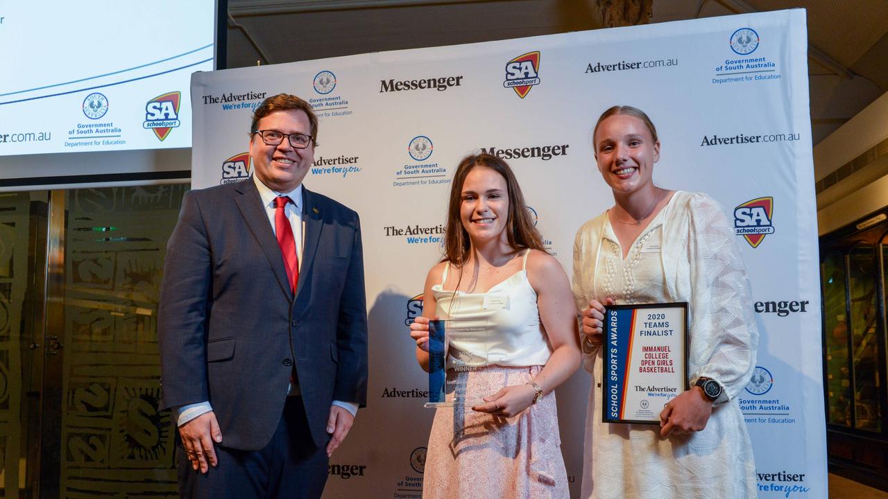 Education Minister John Gardner with winners Sophie Miles and Amy Cotton from Immanuel College at The School Sports Awards at the SA Museum. Picture: Brenton Edwards