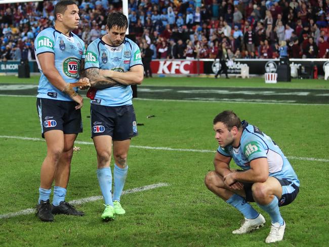 Mitchell Pearce and Wade Graham after the Blues lose the 2017 Origin series. Picture: Brett Costello