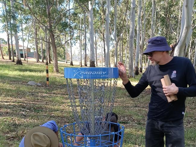 Installing a hole at the Toowoomba Disc Golf Club course are (from left) Qld Disc Golf President Aaron Moreton, Chris Barringer and Gavin Cowan.