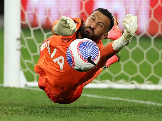 MELBOURNE, AUSTRALIA - MAY 05: Victory goalkeeper Paul Izzo saves a penalty from Terry Antonis of Melbourne City during the A-League Men Elimination Final match between Melbourne Victory and Melbourne City at AAMI Park, on May 05, 2024, in Melbourne, Australia. (Photo by Robert Cianflone/Getty Images)